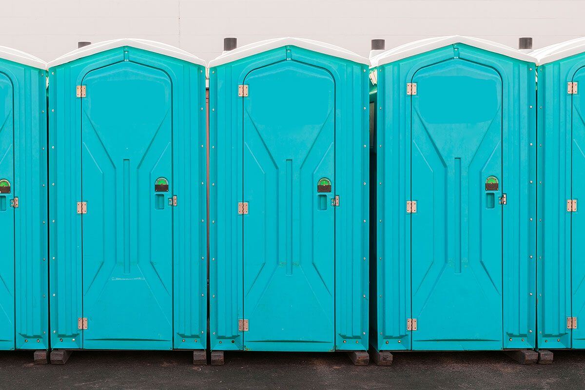 Industrial portable restroom units at a plant in Keene, New York